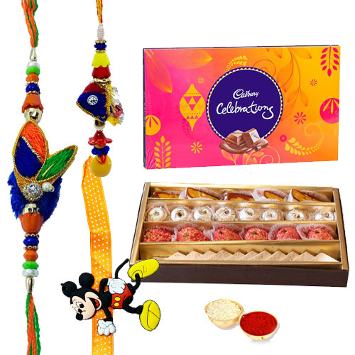 Send Lovely Gift Of Well Prepared Haldirams Sweets And A Pack Of Divine Cadbury Celebration To