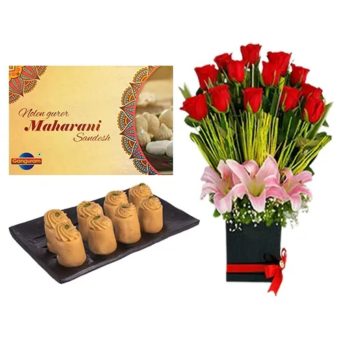 Enjoyable Nolen Gurer Maharani Sandesh from Ganguram with Designer Flower Arrangement